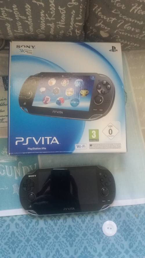 PS VITA + 2 GAMES (AS NEW)(EXCELLENT CONDITION)
